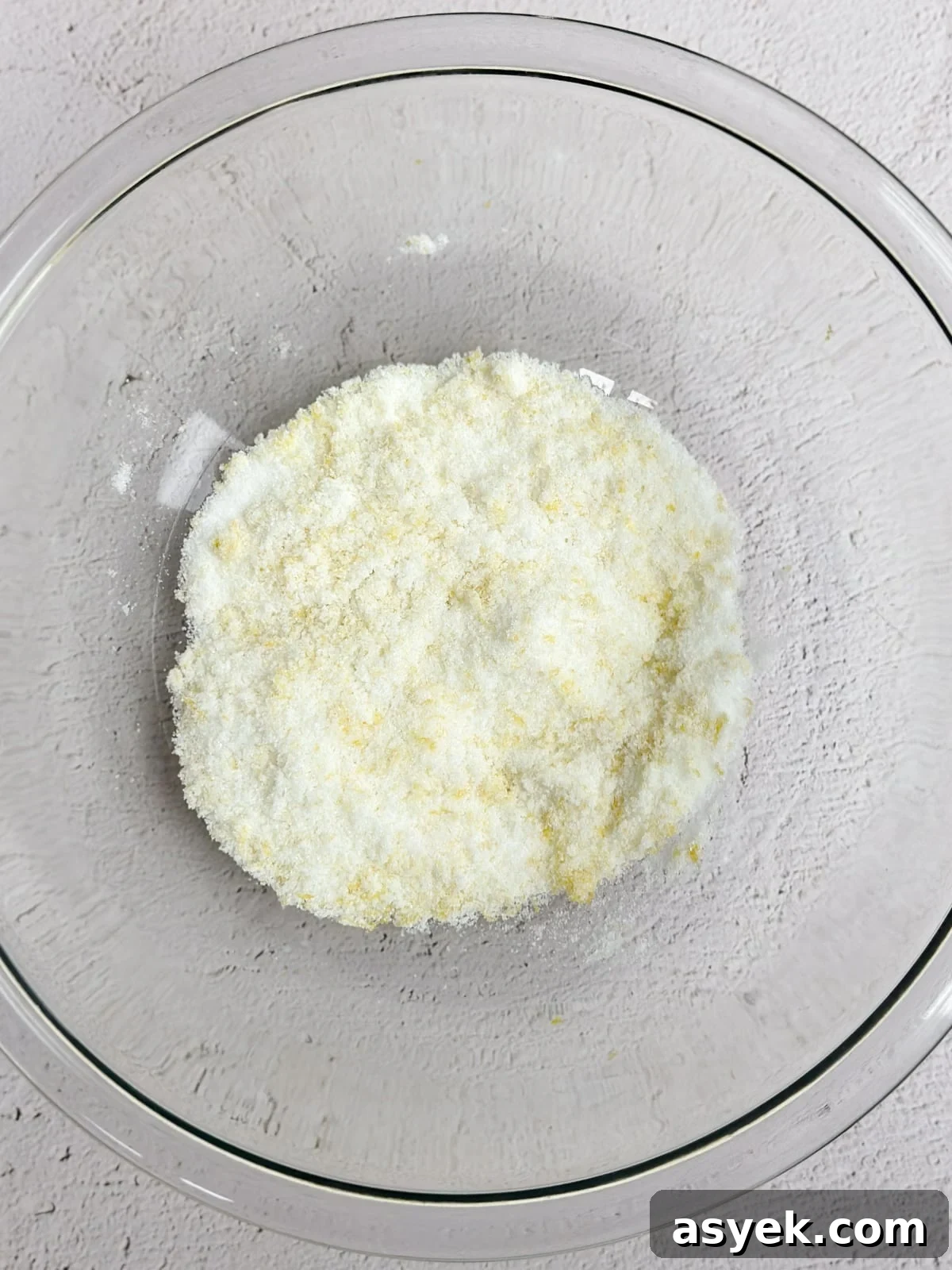 Sugar and lemon zest mixed together.