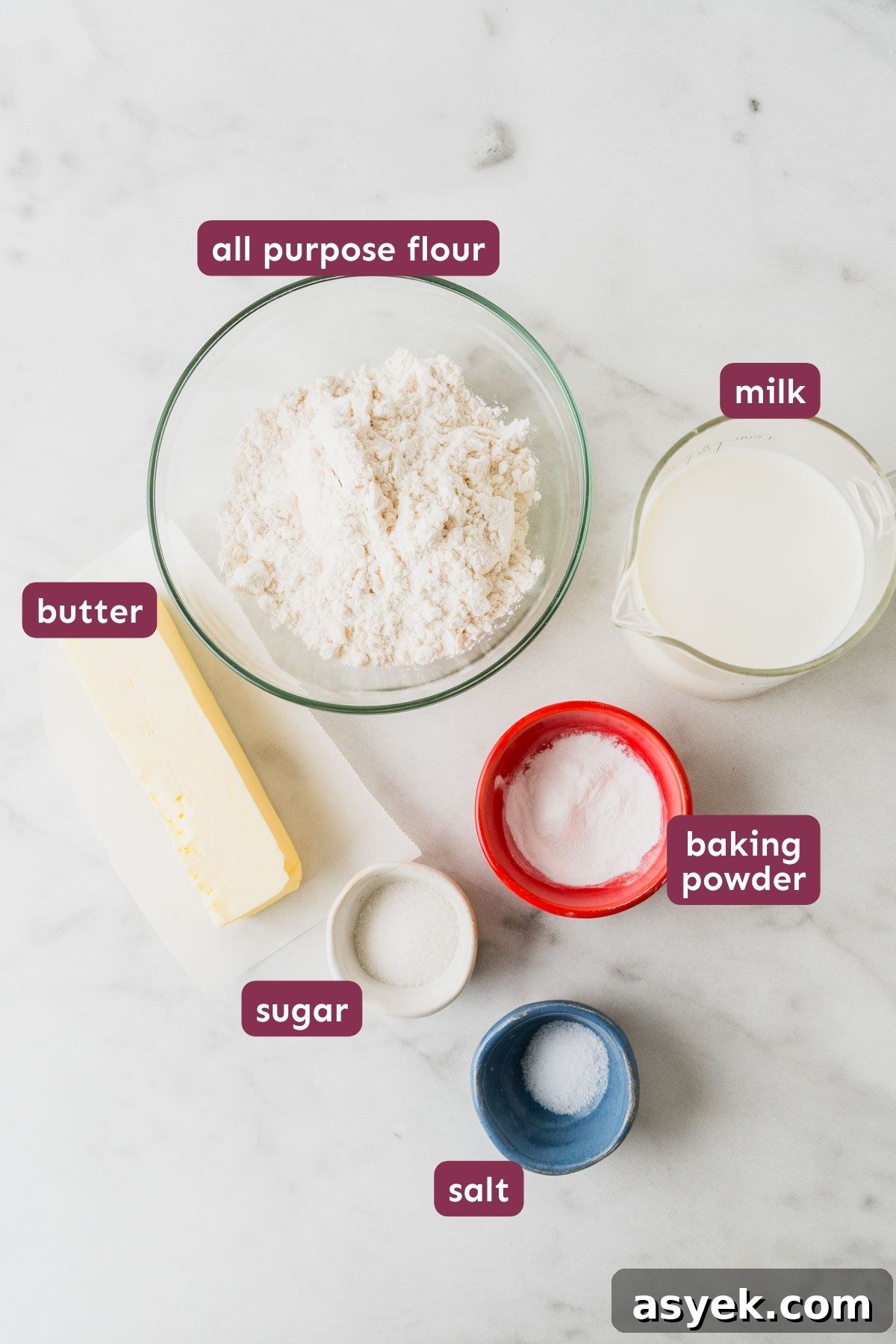 Buttery Air Fryer Biscuits in 15 Minutes 3 ingredients for air fryer biscuits on a white background.