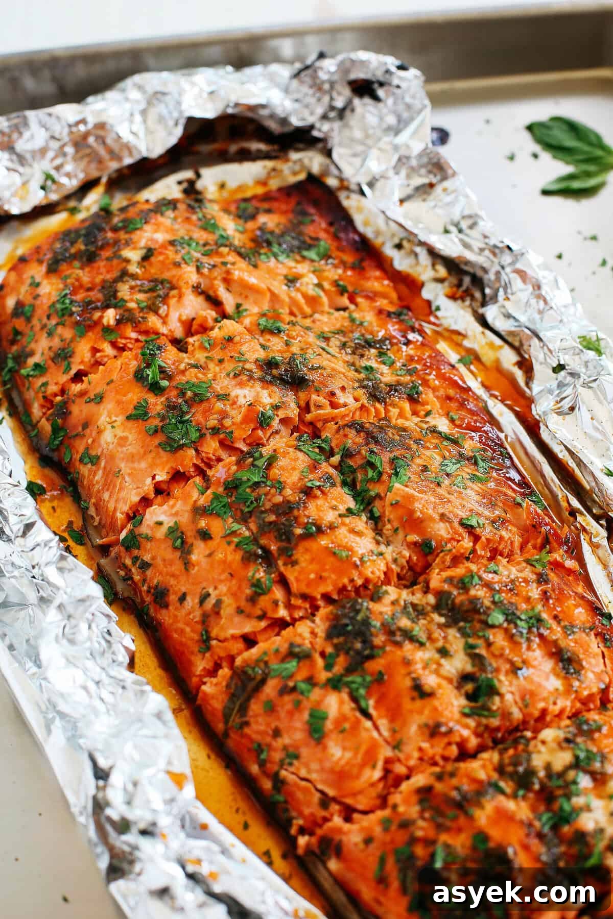 Close-up of glazed salmon with basil