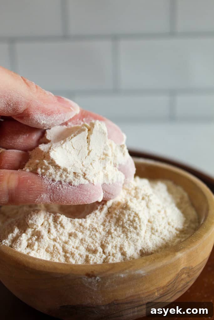Almond Flour Substitutes: 10 Alternatives and How to Use Them 9 hand holding cassava flour.