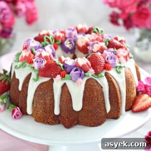 Top view of a decorated Strawberry Swirl Bundt Cake.