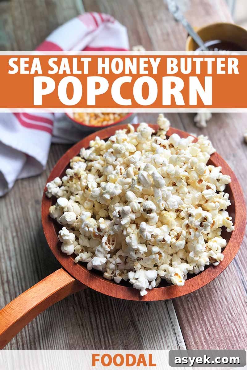 Vertical image of a wooden bowl filled with popped white corn kernels next to a red-striped white towel on a wooden surface, with text on the top and bottom of the image.