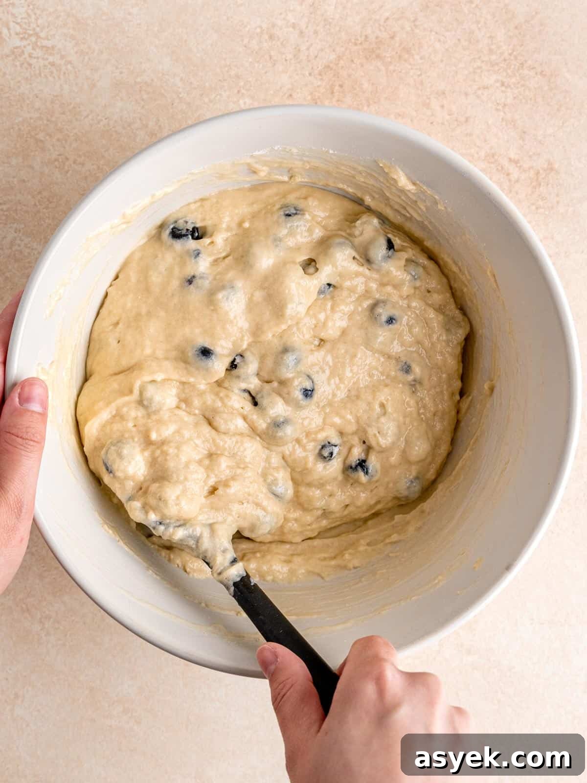 Sourdough discard muffin batter with blueberries.