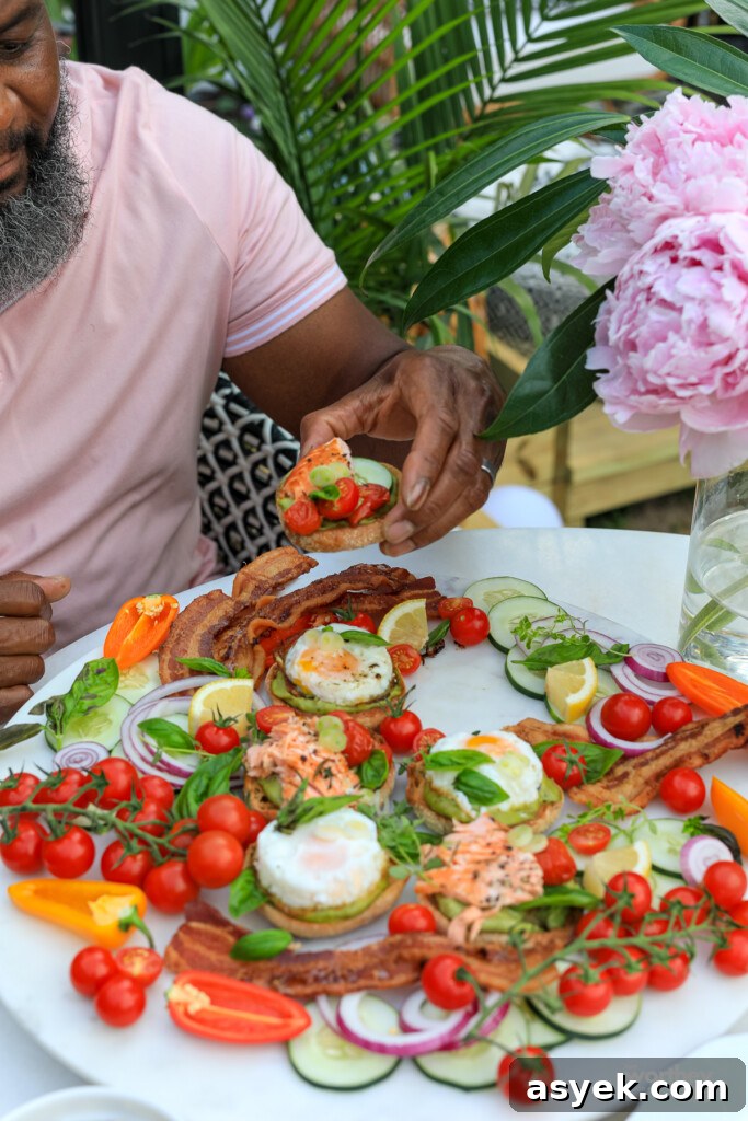 English Muffin Salmon Slider Platter for Brunch and Parties 13 man eating Salmon Brunch sliders