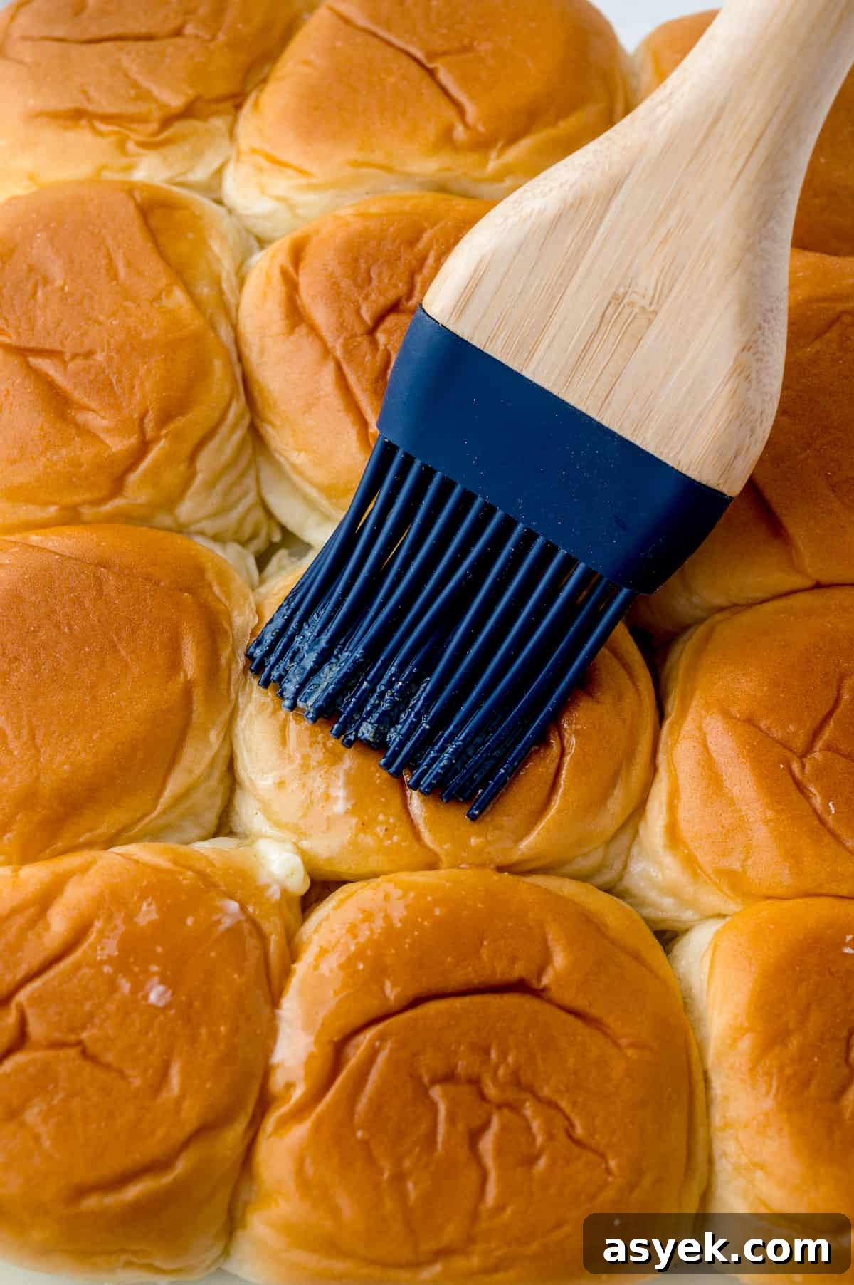 BBQ Pulled Pork Sliders on Hawaiian Rolls Recipe 7 Slider buns brushed with melted butter and garlic.
