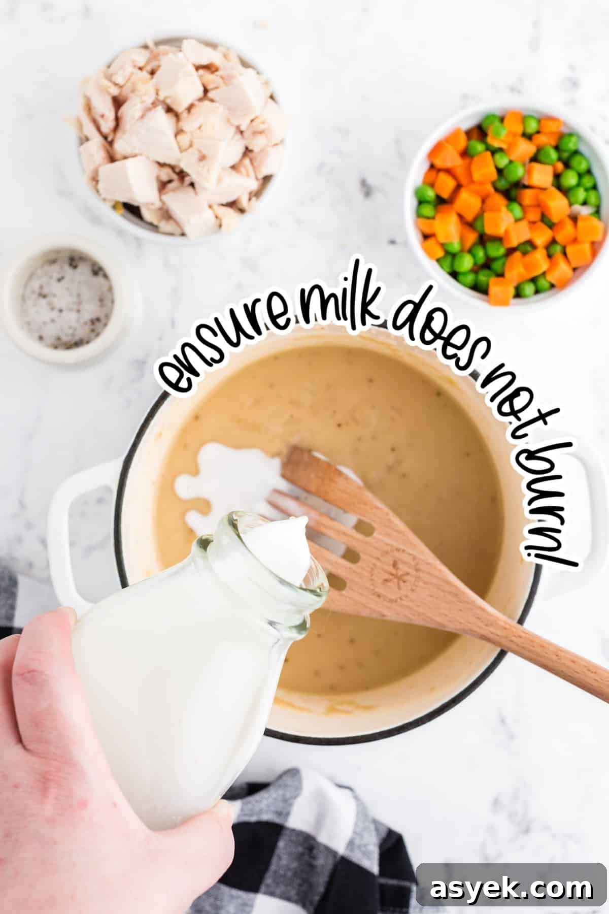 Pouring milk into the filling.