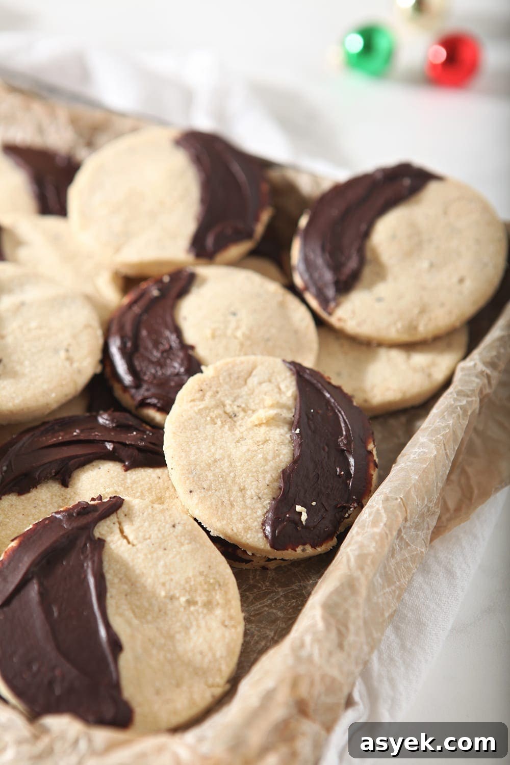 Irresistible Brown Butter Shortbread Cookies Recipe 8 A tray full of Shortbread Brown Butter Cookies with ganache covering half of the cookies