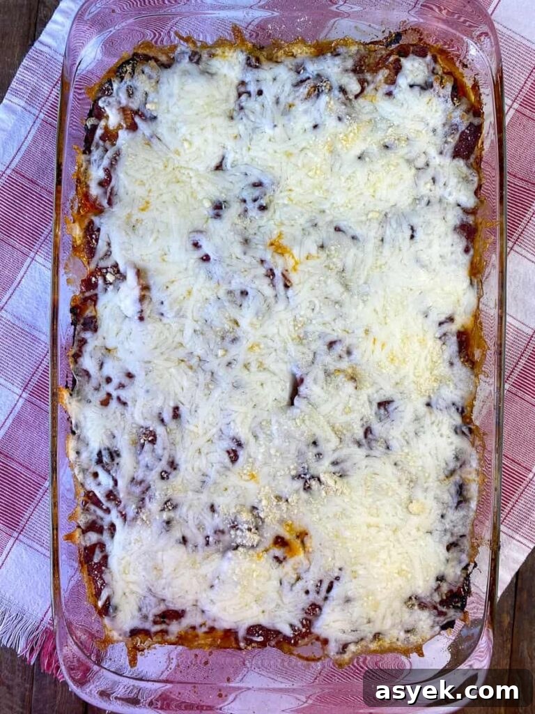 Cheese melted on cream cheese stuffed shells