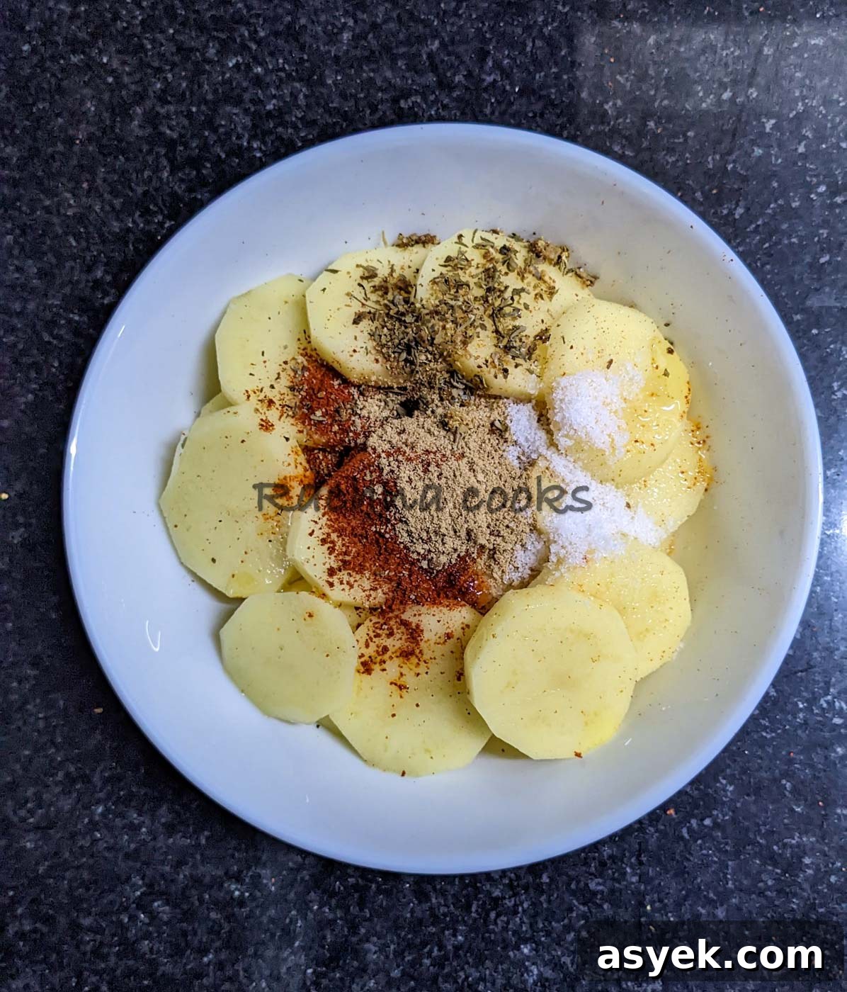 Crispy Air Fryer Potato Slices 6 Drained and dried potato slices with salt and seasonings.