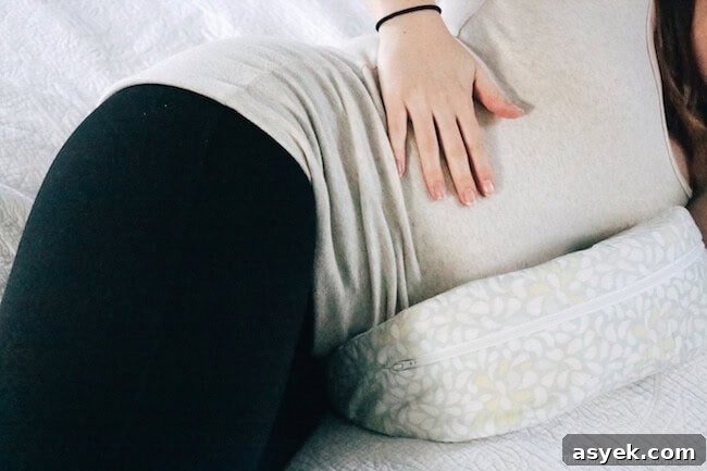 using a pregnancy wedge pillow for side sleeping