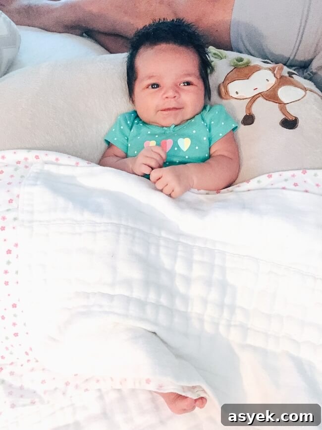 baby sitting in a Boppy pillow