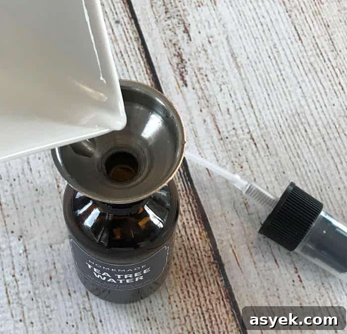 Essential oil toner for acne controls excess oil, shrinks appearance of pores, soothes skin, and reduces redness. {pimples, zits, whiteheads, blackheads, inflamed skin} #essentialoils #essentialoilrecipes #DIYfacetoner #DIYbeauty #essentialoiltoner #easyDIY #essentialoilsforskin #essentialoilsforacne