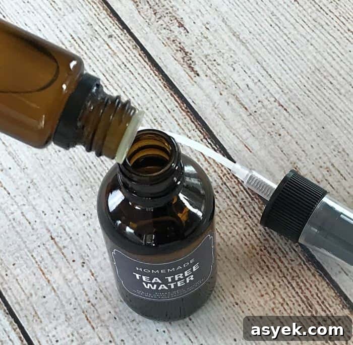 Essential oil toner for acne controls excess oil, shrinks appearance of pores, soothes skin, and reduces redness. {pimples, zits, whiteheads, blackheads, inflamed skin} #essentialoils #essentialoilrecipes #DIYfacetoner #DIYbeauty #essentialoiltoner #easyDIY #essentialoilsforskin #essentialoilsforacne