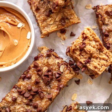 Brown Butter Peach Crumble Bars Recipe 17 Peanut butter banana bars cut sitting next to peanut butter.