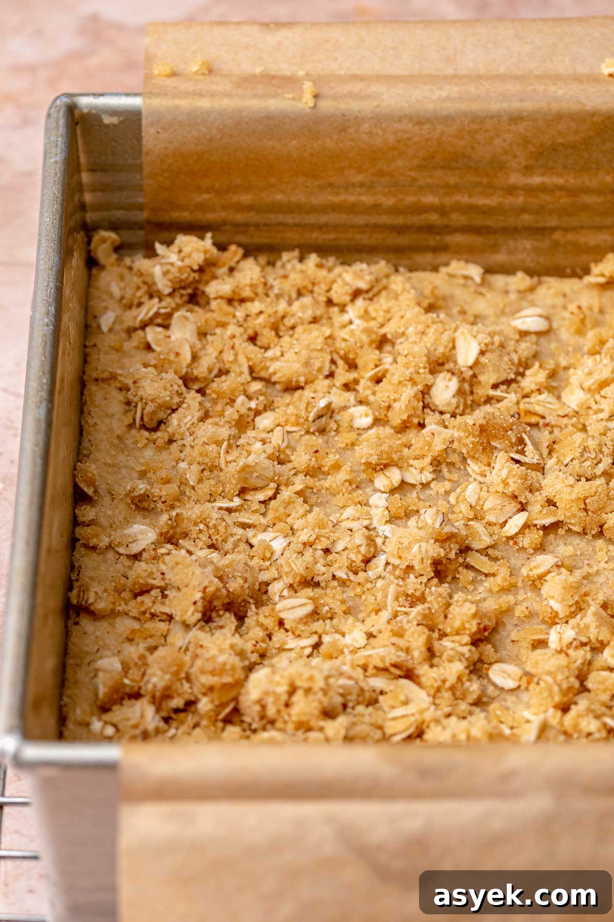 Brown Butter Peach Crumble Bars Recipe 10 Pieces of oatmeal crumble on baked shortbread.