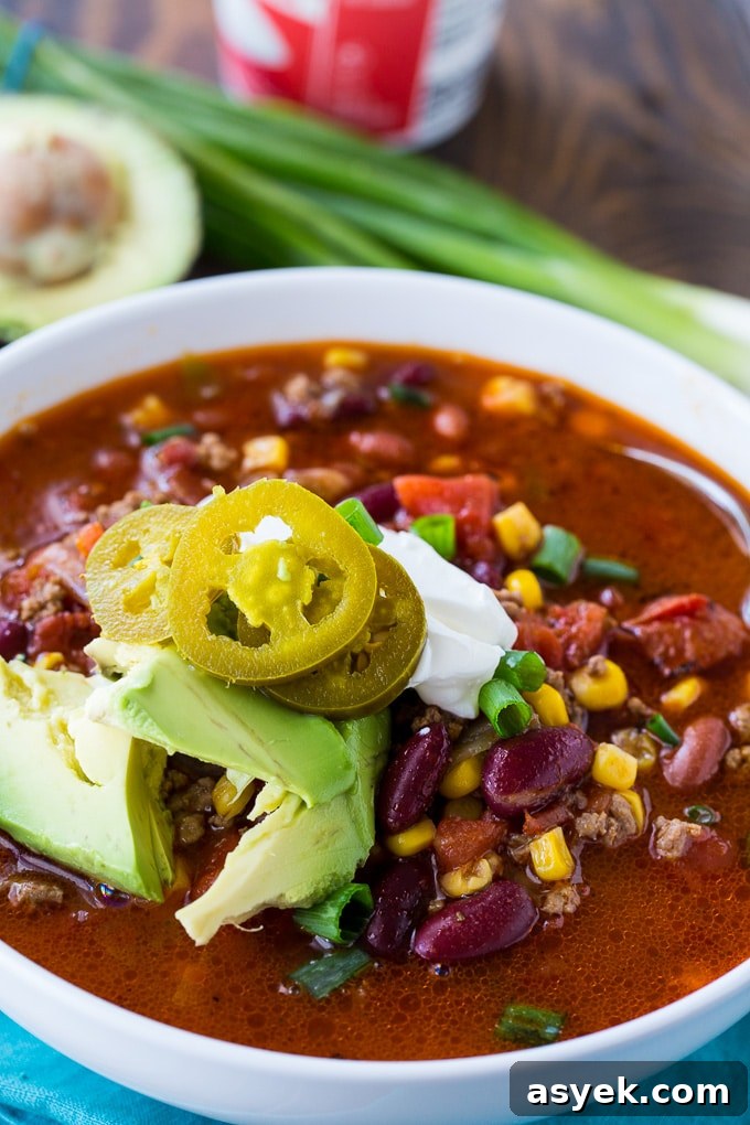 Instant Pot Taco Soup made with ground beef and taco seasoning. Quick and easy dinner recipe!
