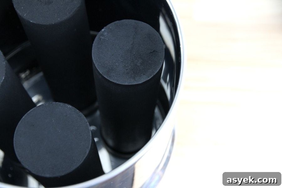 Black Berkey water filters fitted into the top canister of the Big Berkey