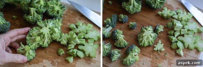 chopping broccoli on a cutting board for soup.