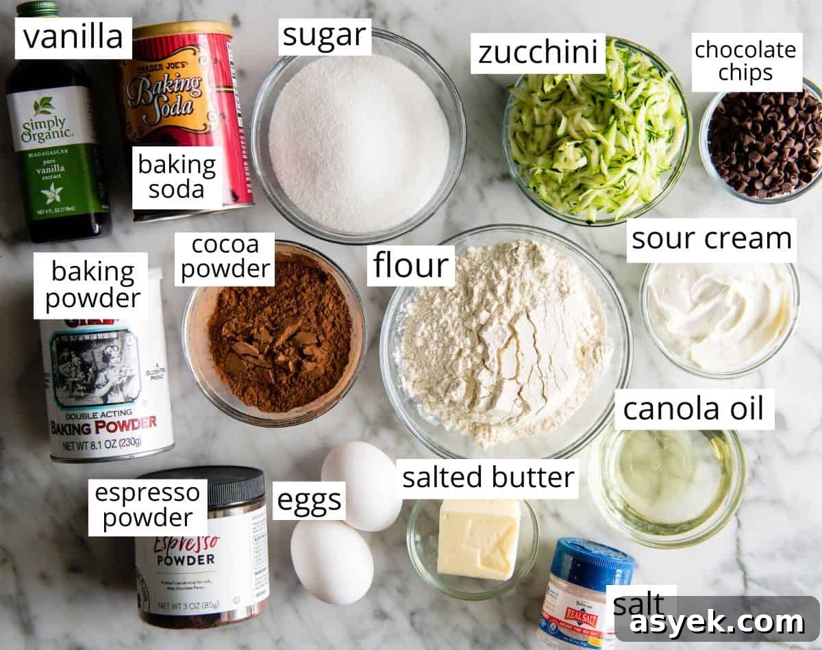 Ingredients for Chocolate Zucchini Cake overhead view of the labeled ingredients in this chocolate zucchini cake recipe