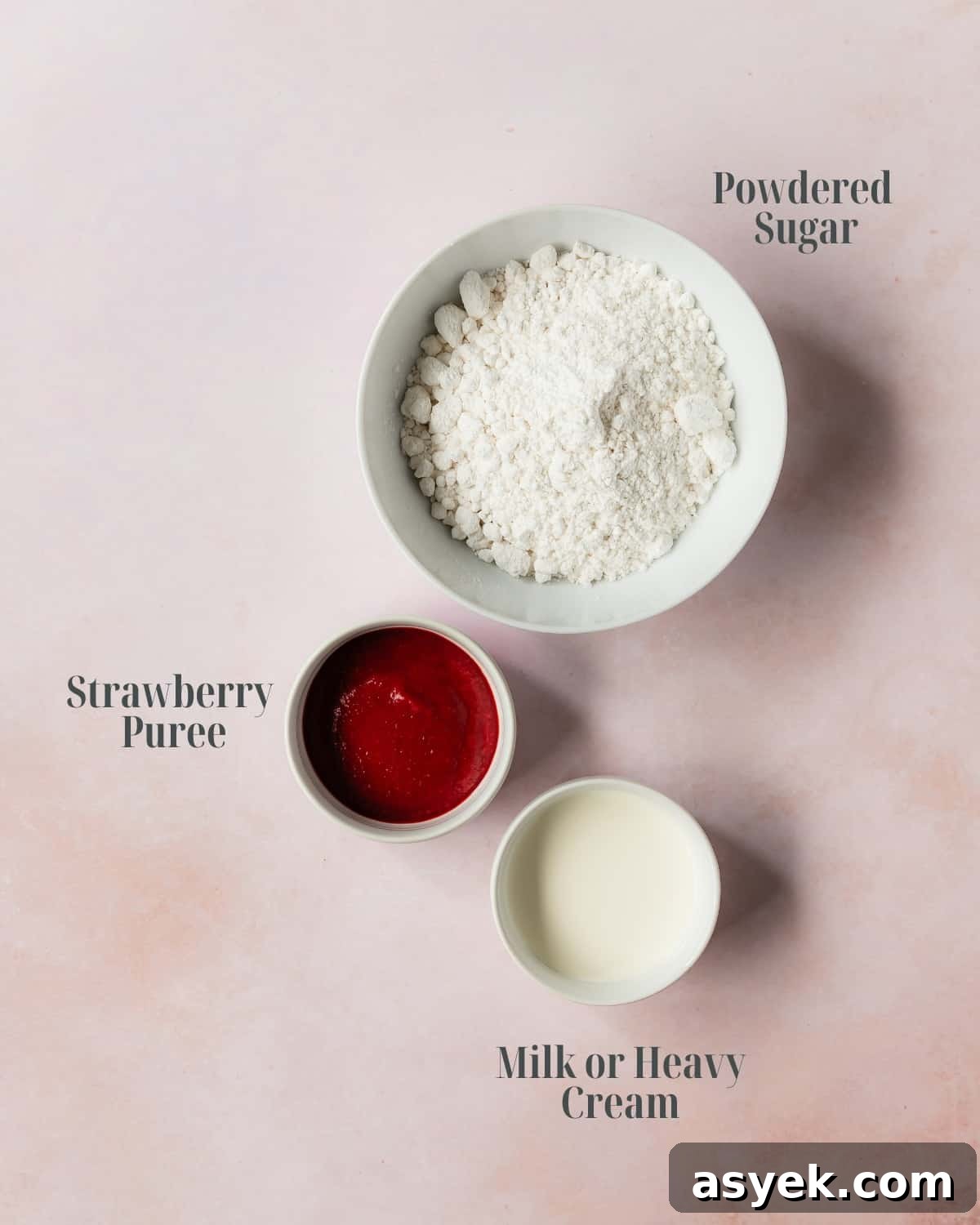 Strawberry Glaze - Gather strawberry puree, powdered sugar and heavy cream or milk.