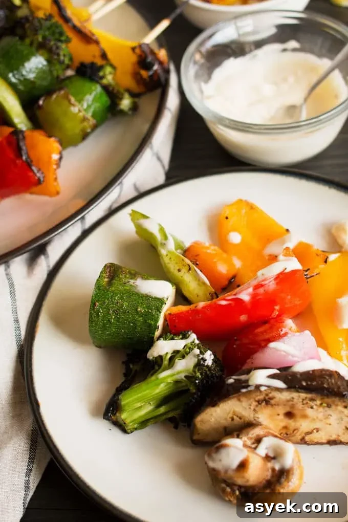 How to Make Grilled Rainbow Vegetable Kabobs 7 These rainbow veggie kabobs are the perfect summer side dish! Serve them with my delicious and easy to make grilled lemon garlic sauce.