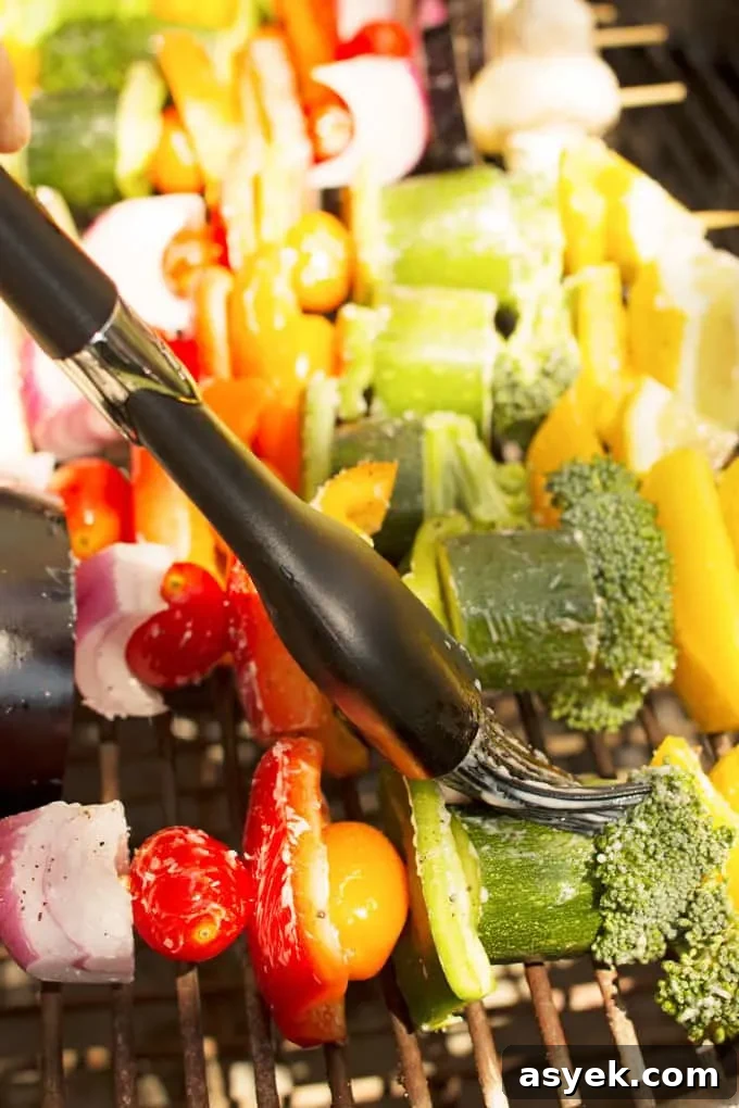 How to Make Grilled Rainbow Vegetable Kabobs 4 These rainbow veggie kabobs are the perfect summer side dish! Serve them with my delicious and easy to make grilled lemon garlic sauce.