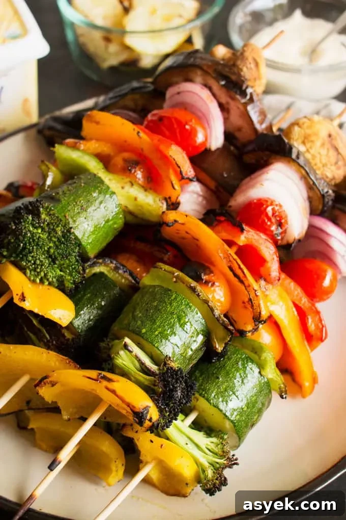 How to Make Grilled Rainbow Vegetable Kabobs 5 These rainbow veggie kabobs are the perfect summer side dish! Serve them with my delicious and easy to make grilled lemon garlic sauce.