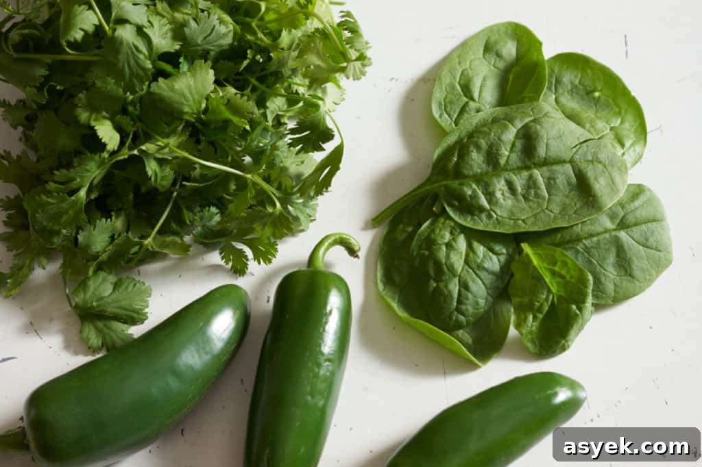 Cilantro, spinach, and jalapeño peppers.