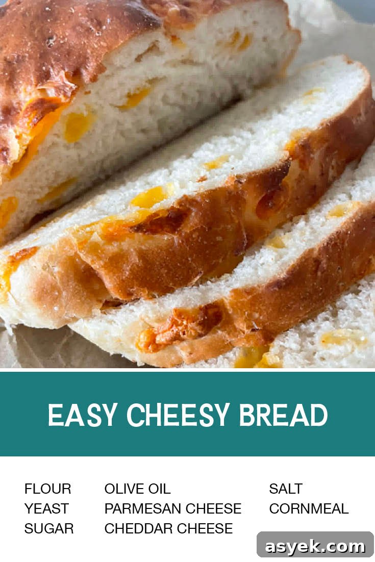 Cheesy Pull-Apart Bread Recipe 9 Pinterest picture of Easy Cheesy Bread with the text of the ingredients at the bottom and the text of the title above the ingredients list.
