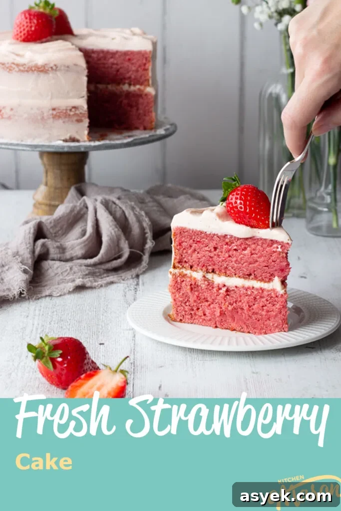 Someone pushing a fork into a slice of strawberry cake. A text overlay says "fresh strawberry cake".
