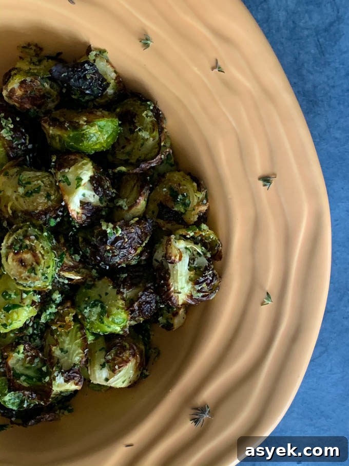 Roasted Brussels Sprouts with lemon zest, thyme, parsley, and pecorinorino