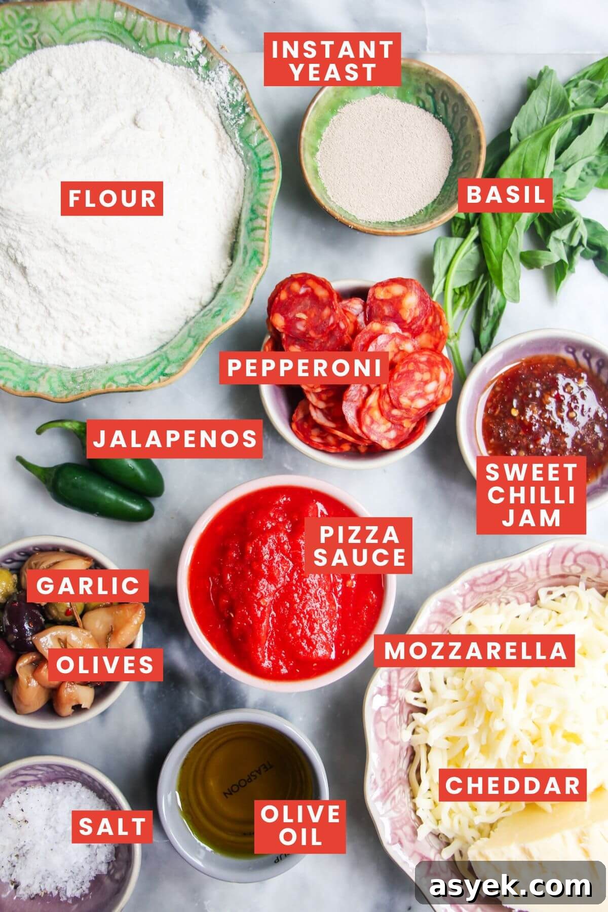 Pepperoni Focaccia Pizza Bread with Crispy Cheese Crust 3 Focaccia pizza ingredients laid out on a grey marble background and labelled.