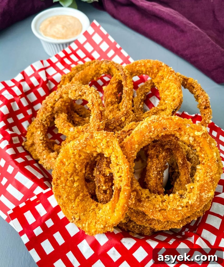 keto low carb onion rings in a red and black basket