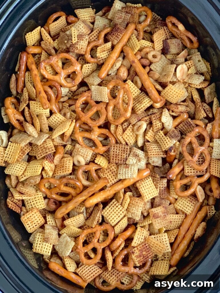 Yummy chex mix in a crockpot.