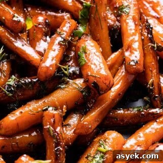 honey glazed carrots with herb garnish