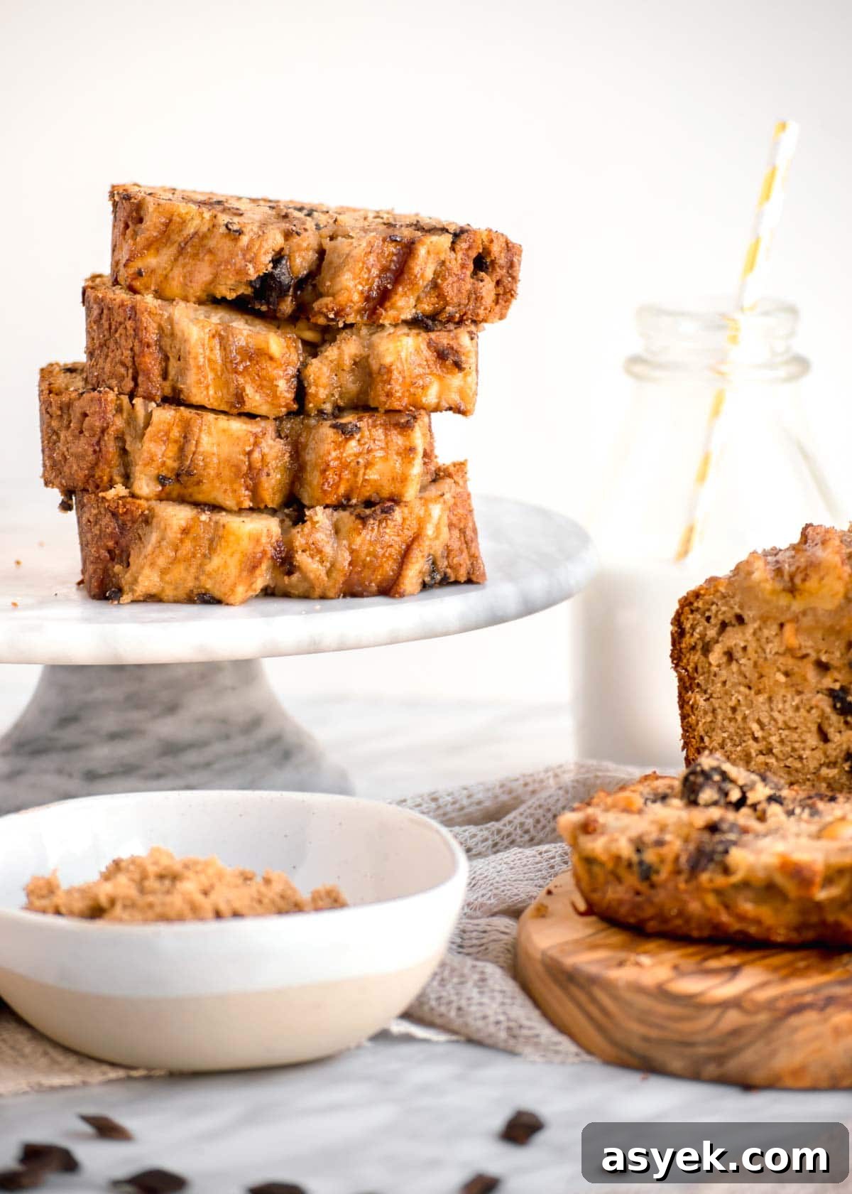 Sliced of Chocolate Chip Banana Bread with Walnuts Stacked.