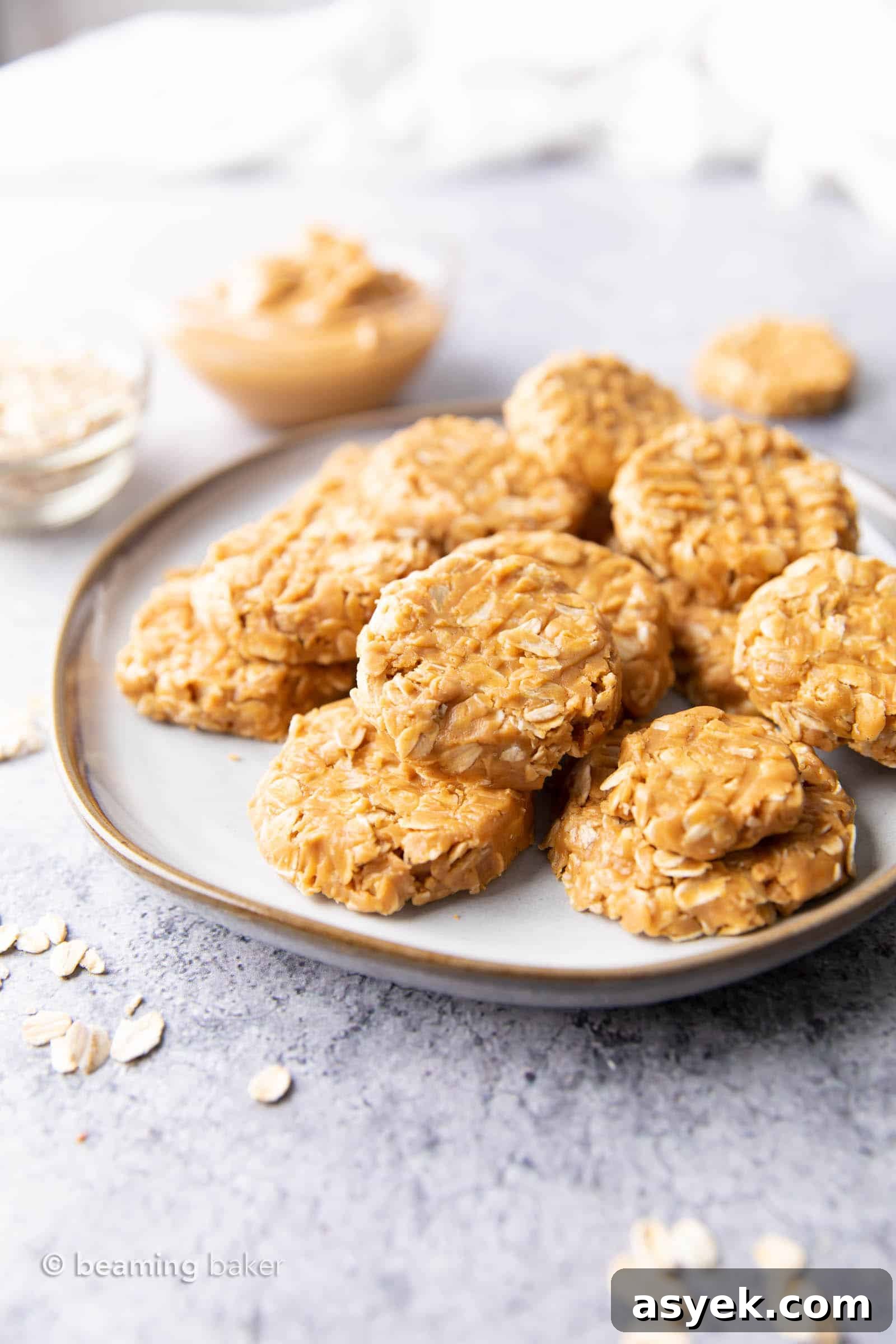Plate of no bake peanut butter cookies on a gray table.