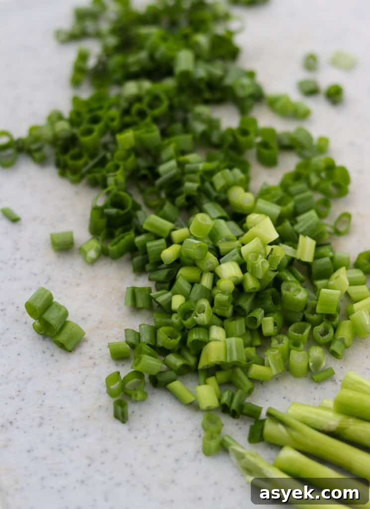 Soft Whole Wheat Rye Flatbread Recipe with Scallions 3 Chopped scallions on a cutting board