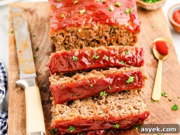Sliced Lipton onion soup meatloaf covered in a tangy ketchup glaze.