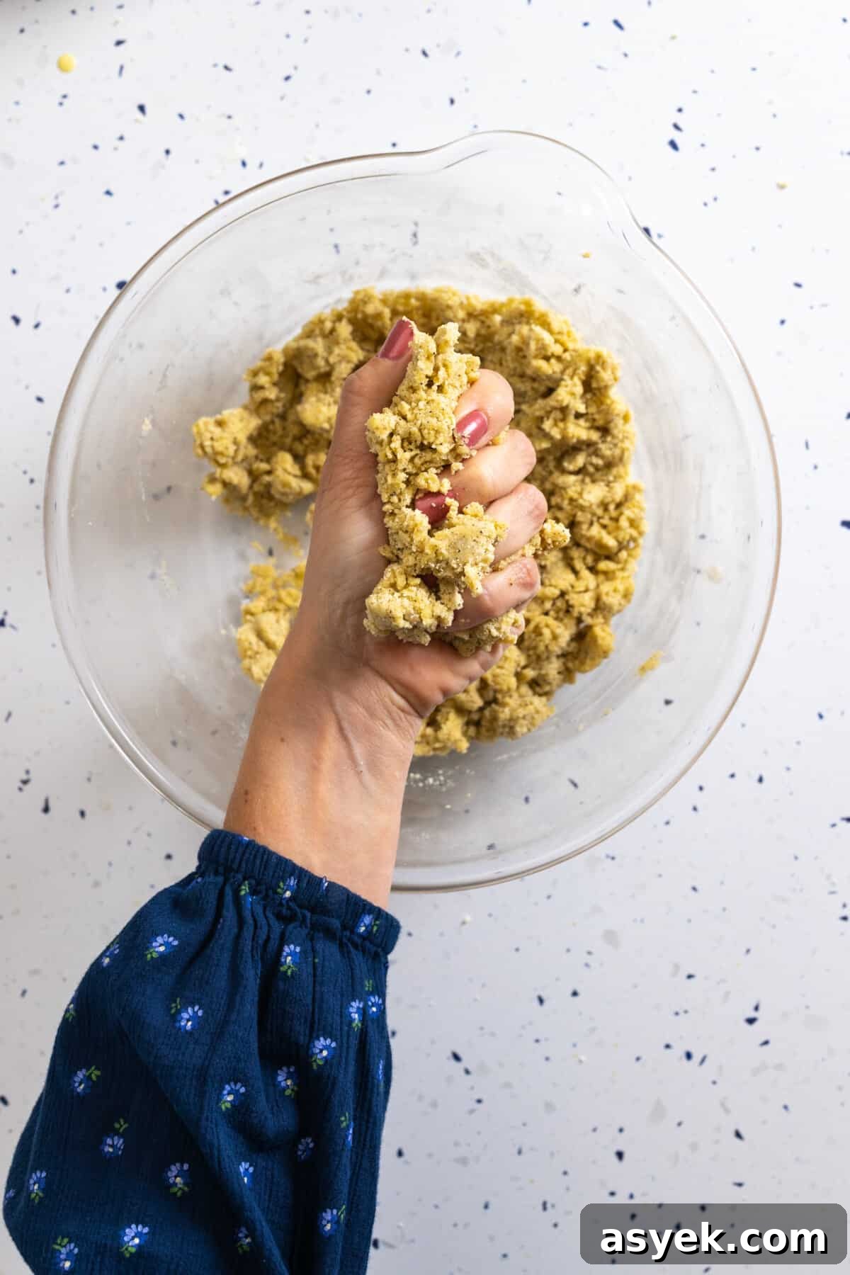testing tart dough hydration by squeezing
