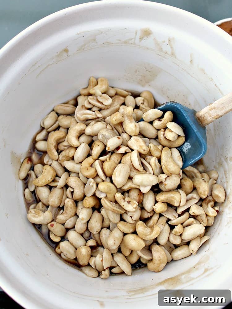 Honey Roasted Cajun Cashews adding honey to the nuts