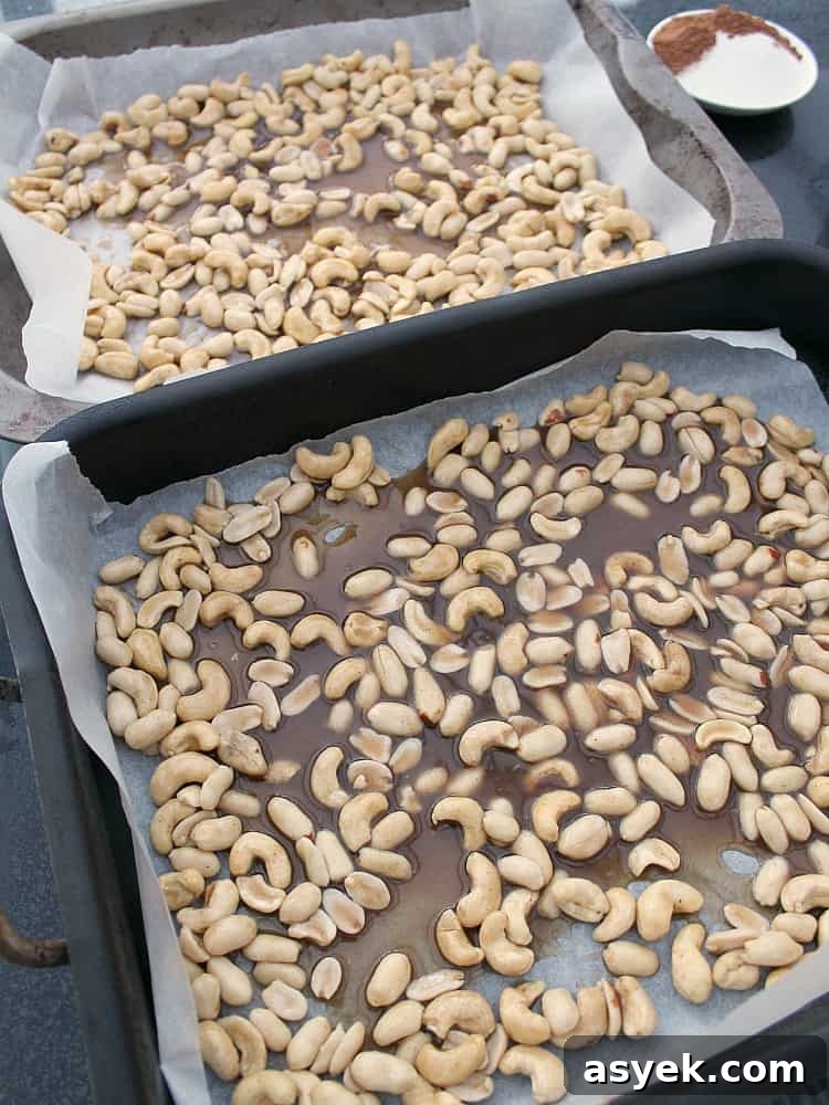 Honey Roasted Cajun Cashews transferred to baking tray