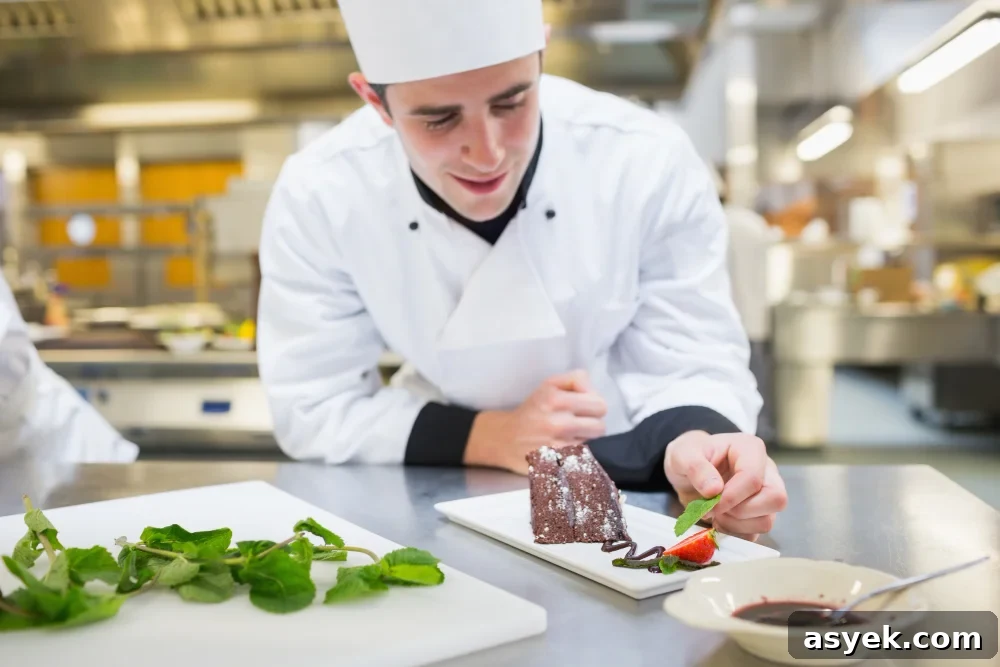 handsome chef plating dishes