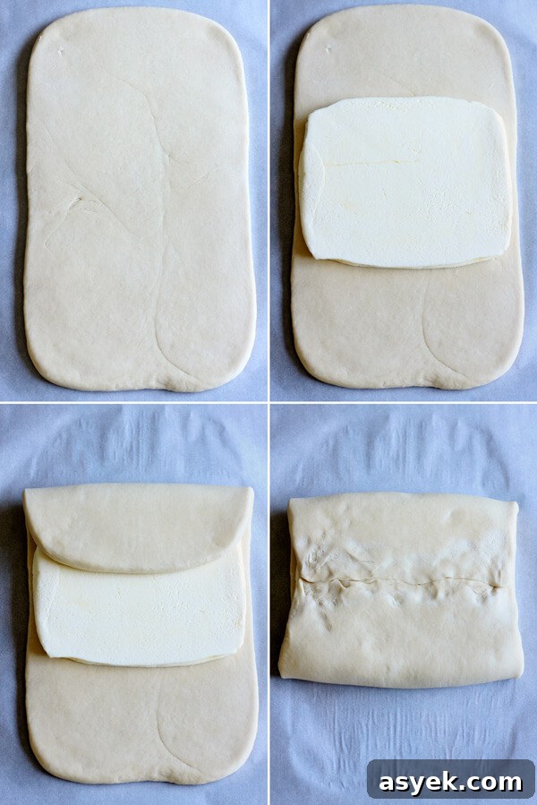How to Make Butter Croissants at Home — Croissant Series Part 1 9 Encasing dough with butter for lamination for my French croissant recipe.