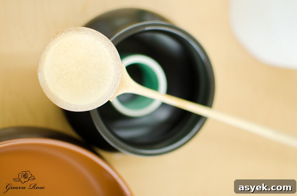 Water ladle laid across bowls