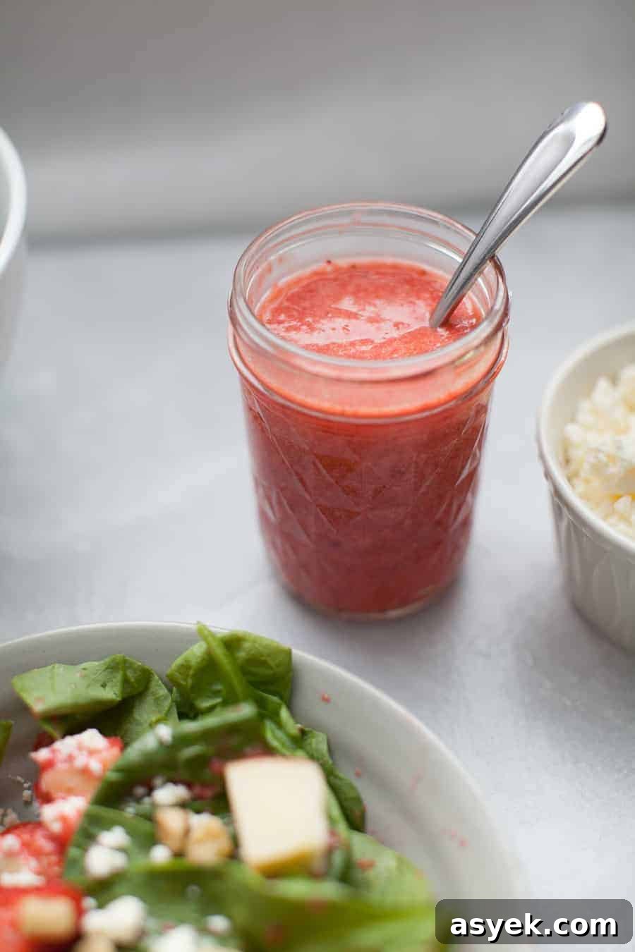 Strawberry Spinach Salad with Balsamic Vinaigrette 7 Freshly tossed strawberry spinach salad ready to serve.
