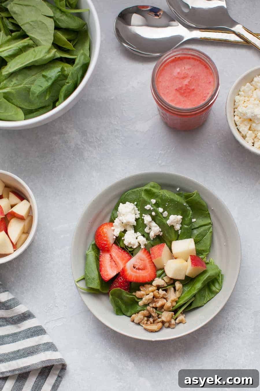Strawberry Spinach Salad with Balsamic Vinaigrette 8 Bottle of strawberry vinaigrette dressing on a kitchen counter.