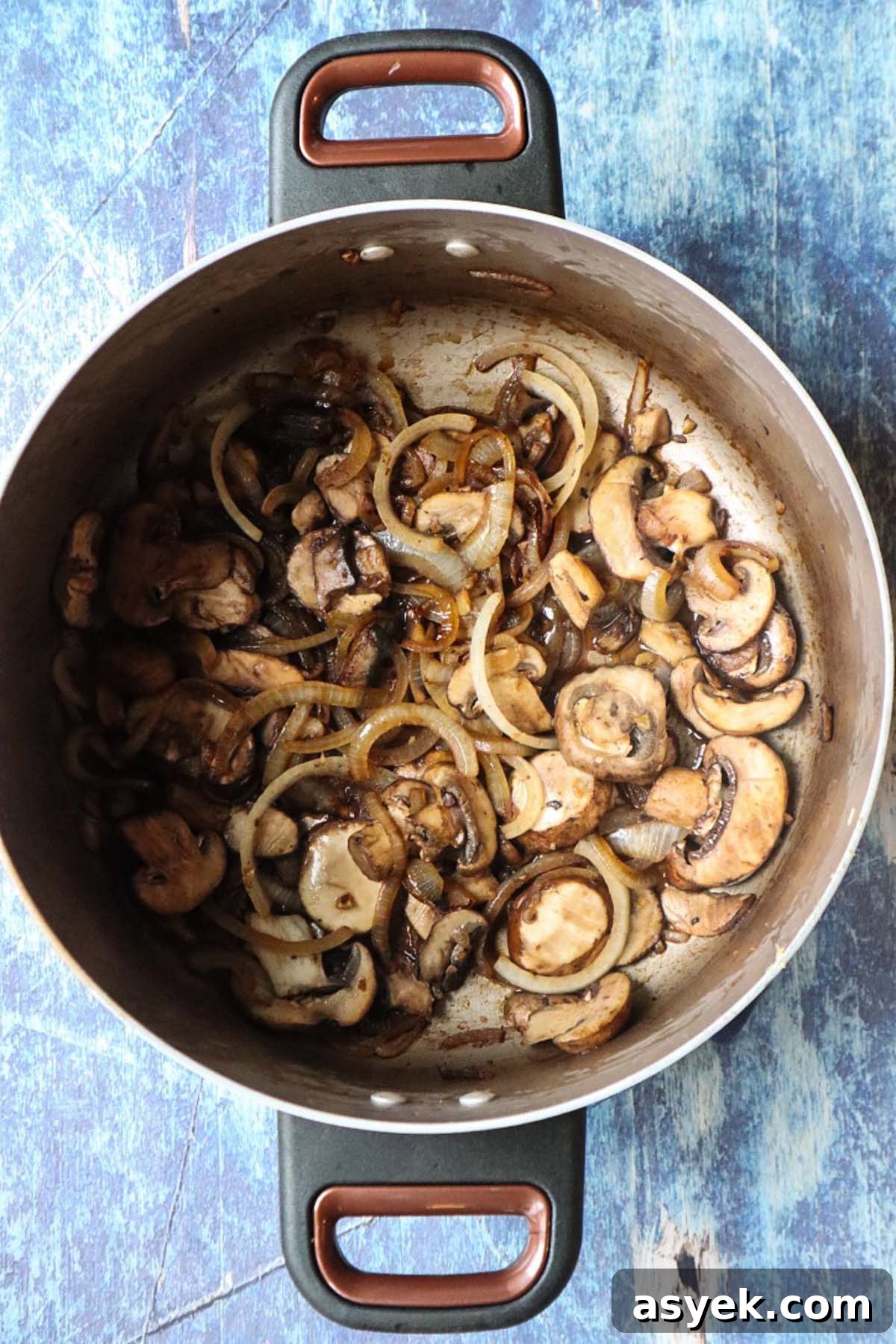pot with mushrooms and onion