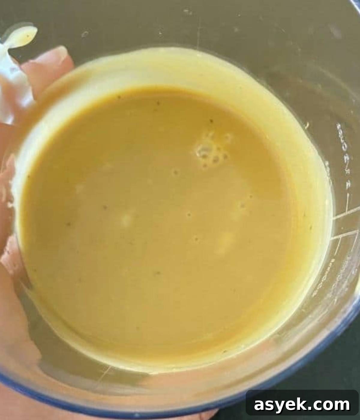 salad dressing being blended