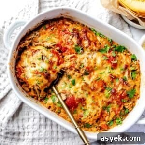 Spaghetti Squash Lasagna in a white casserole dish.